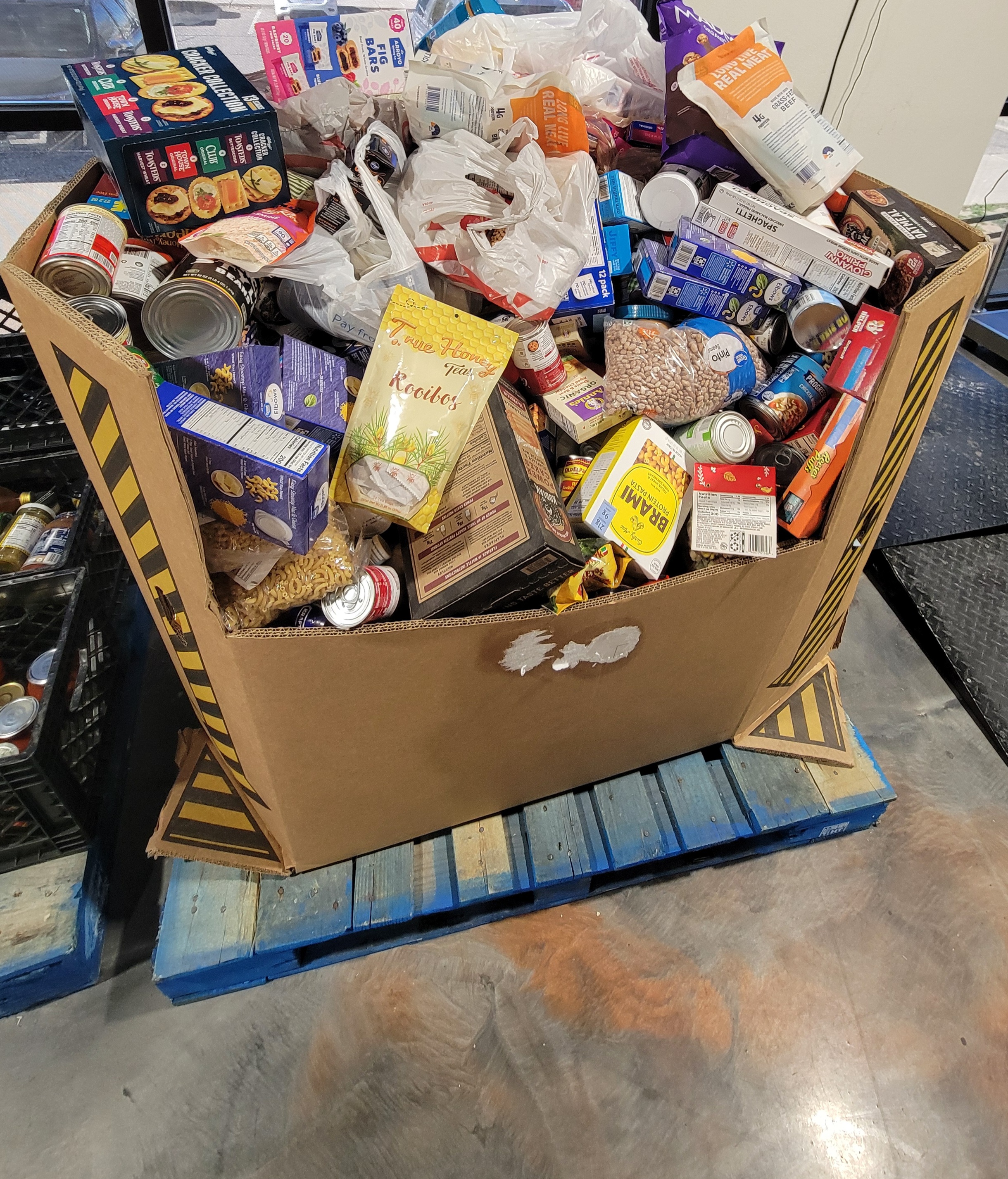 Cardboard container full of food.